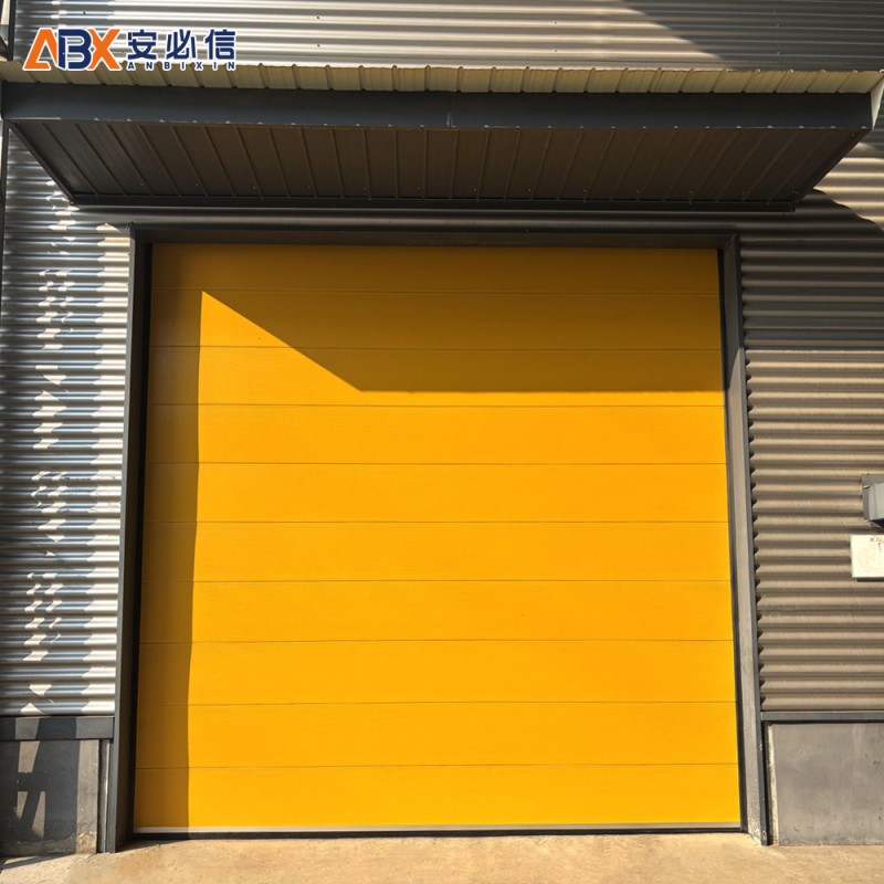 安必信分节式提升滑升门｜翻版上排垂直提升门｜高扬程升降工业门上门测量